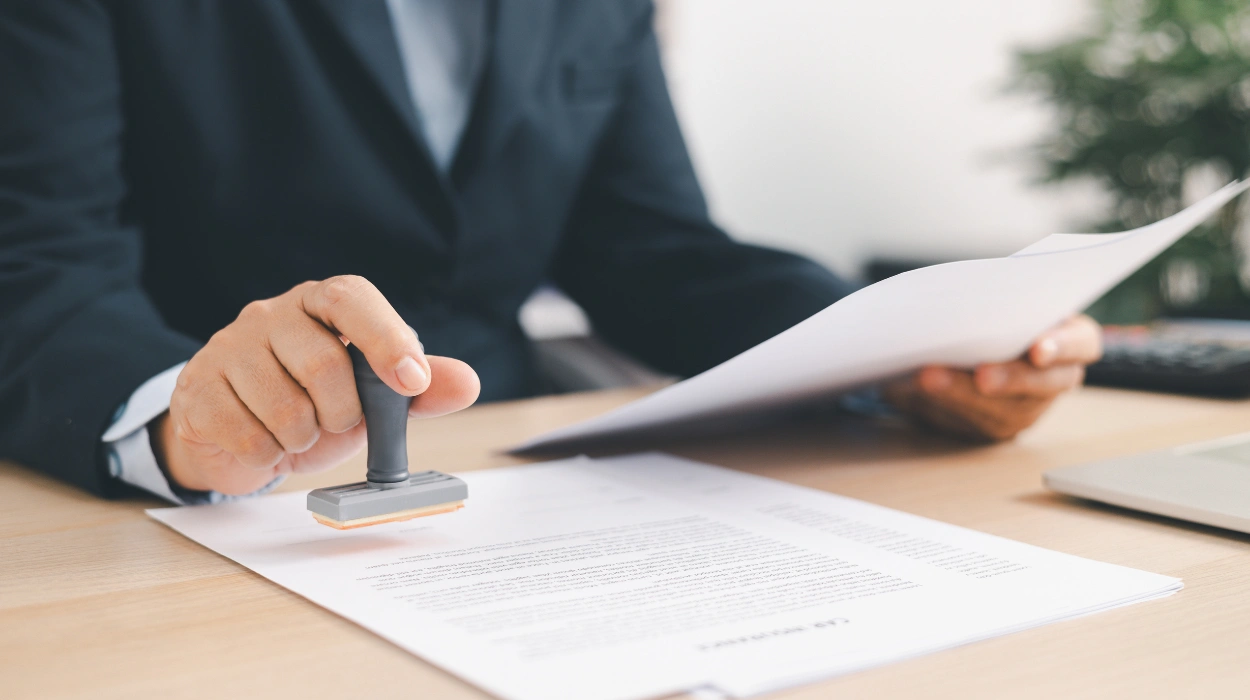 business documents on a desk for compliance planning